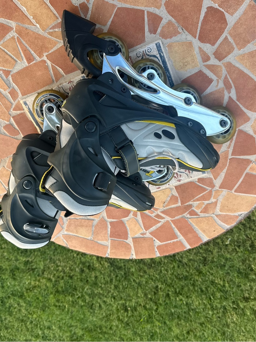 Forward formula adjustable Black and Gray Inline Roller Skates with Yellow Trim